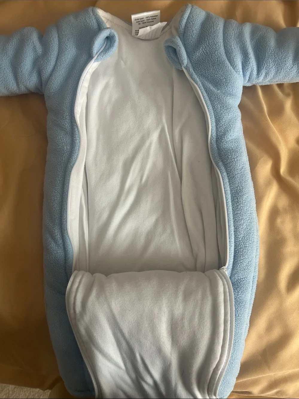 Baby Merlin size 3-6months small 12-18lbs.  Baby Merlin’s magic sleepsuit blue